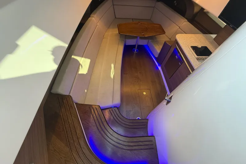  Yacht Photos Pics Luxurious interior of 2024 Boston Whaler 420 Outrage with elegant seating and ambient lighting.