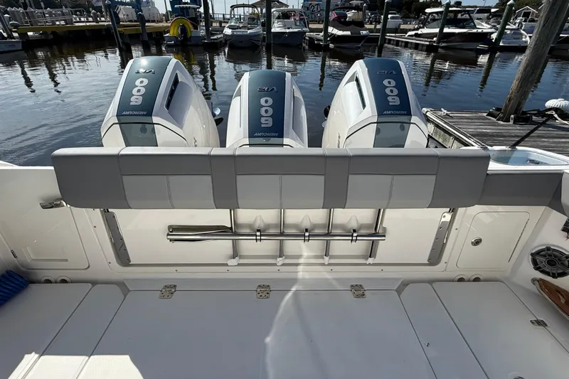  Yacht Photos Pics 2024 Boston Whaler 420 Outrage with triple Mercury 600 engines at marina.