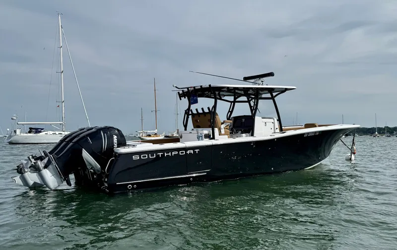  Yacht Photos Pics 2020 Southport 33 FE boat on water, featuring dual outboard motors.