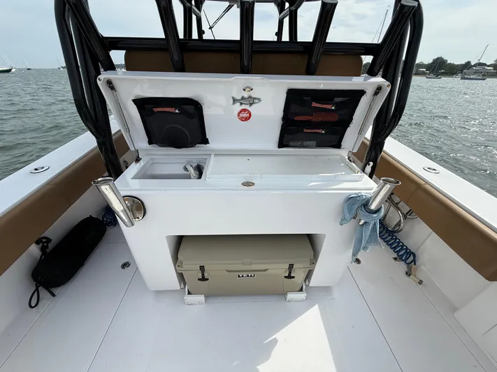  Yacht Photos Pics 2020 Southport 33 FE boat interior with fishing station and storage compartments.