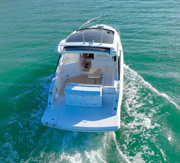  Yacht Photos Pics 2022 Schaefer 375 HT yacht cruising on clear turquoise waters.