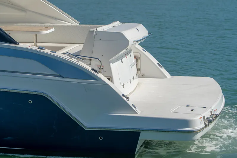  Yacht Photos Pics Schaefer 375 HT 2022 yacht rear view on water, showcasing sleek design.