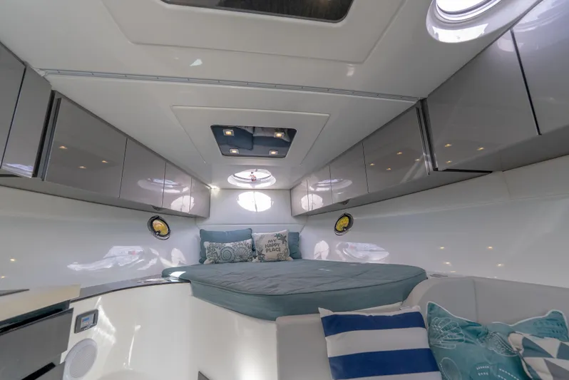  Yacht Photos Pics 2022 Schaefer 375 HT yacht interior with modern design and comfortable bedding.