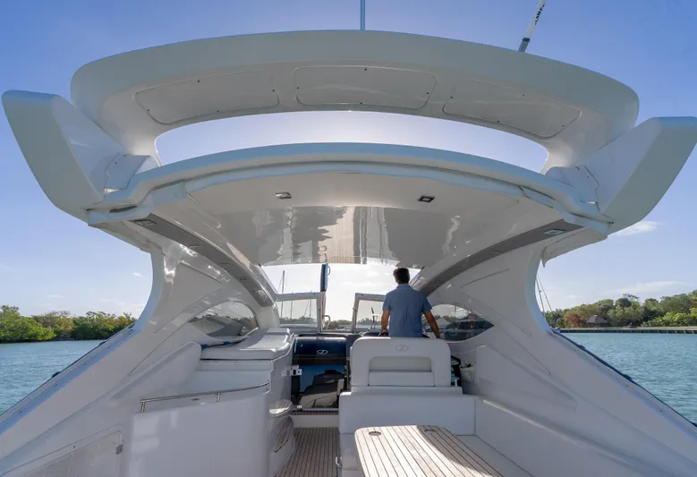  Yacht Photos Pics 2022 Schaefer 375 HT yacht with sleek design, cruising on a sunny day.