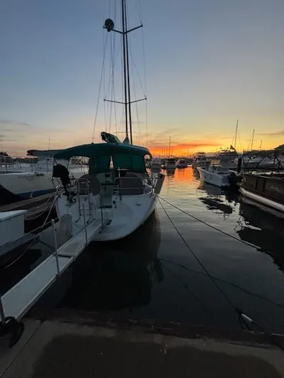  Yacht Photos Pics Jeanneau Sun Odyssey 40 sailboat docked at sunset, 2002 model.