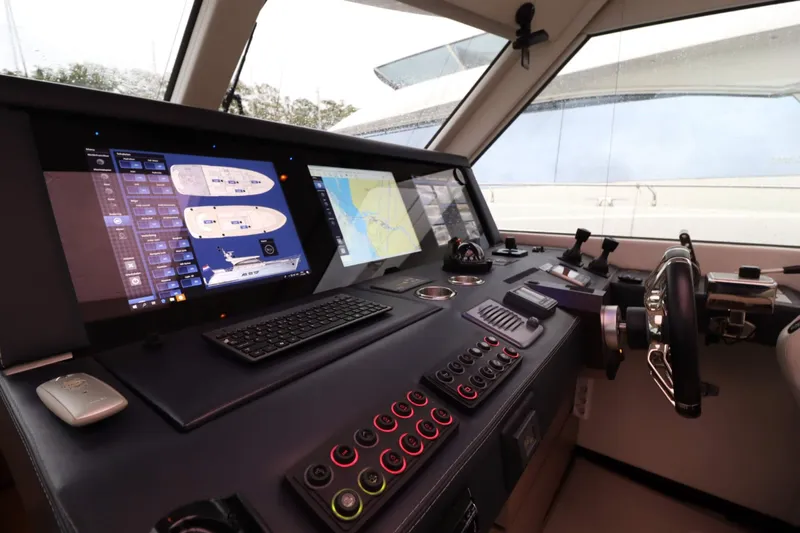  Yacht Photos Pics Cockpit of 2012 Vivante 55 HT yacht with advanced navigation systems and controls.