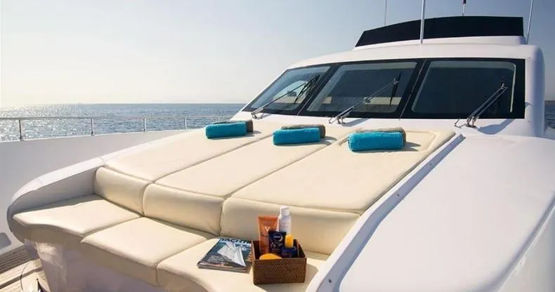  Yacht Photos Pics Luxury Admiral 85 yacht deck with sunbathing area, towels, and ocean view, 2008 model.