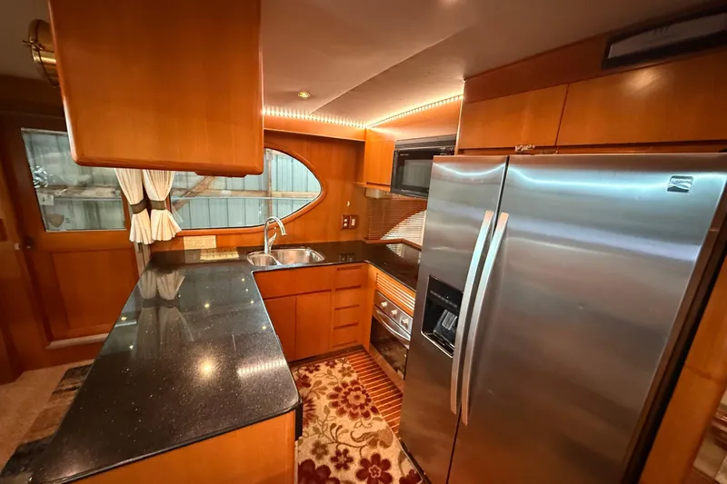 Bonnie Jean Yacht Photos Pics Luxurious kitchen interior of 1998 Ocean Alexander Pilothouse Model 584 yacht.