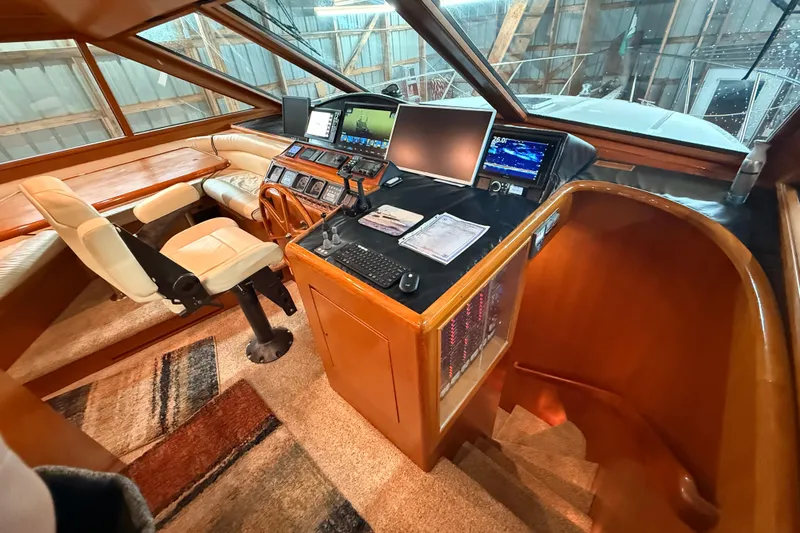 Bonnie Jean Yacht Photos Pics 1998 Ocean Alexander Pilothouse Model 584 interior with navigation equipment and seating area.
