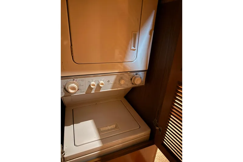 Bonnie Jean Yacht Photos Pics Stacked washer and dryer in 1998 Ocean Alexander Pilothouse Model 584 yacht.
