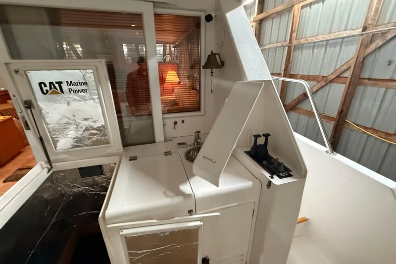 Bonnie Jean Yacht Photos Pics 1998 Ocean Alexander Pilothouse Model 584 interior with CAT Marine Power equipment.