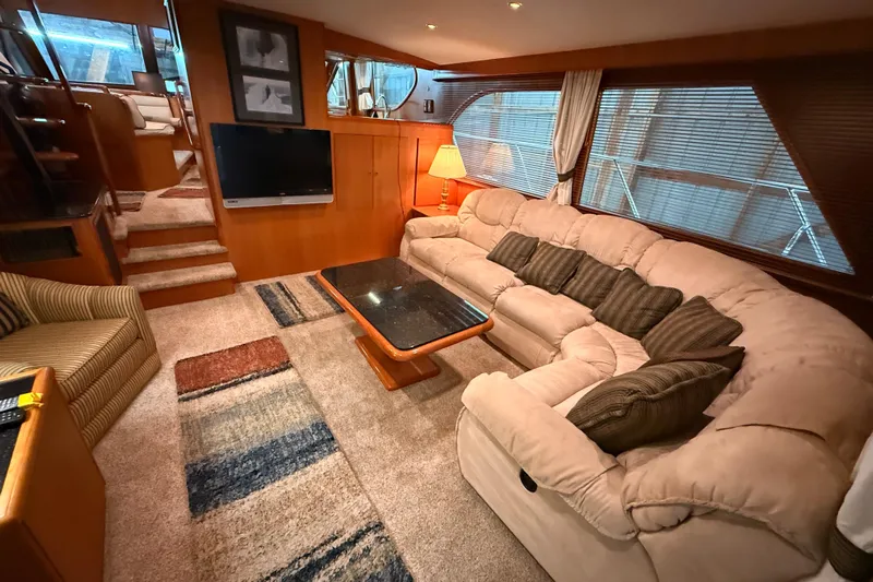 Bonnie Jean Yacht Photos Pics Luxurious 1998 Ocean Alexander Pilothouse Model 584 interior with plush seating and elegant decor.