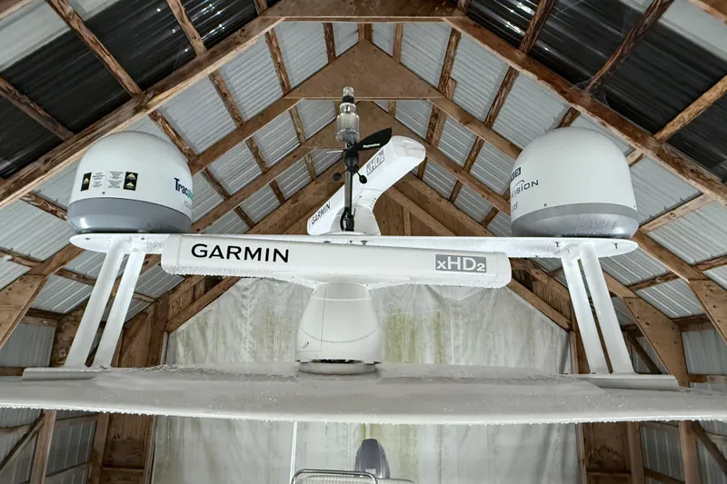 Bonnie Jean Yacht Photos Pics Radar equipment on 1998 Ocean Alexander Pilothouse Model 584 in a wooden boathouse.