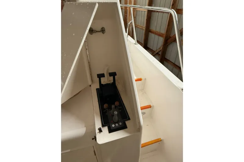 Bonnie Jean Yacht Photos Pics 1998 Ocean Alexander Pilothouse Model 584 control panel and stairs in a boat interior.