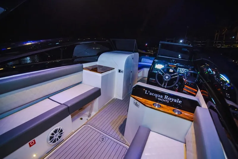 Lr280 Yacht Photos Pics 2024 L'acqua Royale LR280 GRAN CABRIO yacht interior with luxurious seating and modern dashboard.