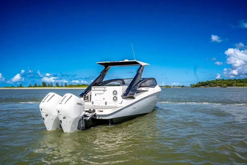 Lr280 Yacht Photos Pics 2024 L'acqua Royale LR280 GRAN CABRIO boat on open water under clear blue sky.