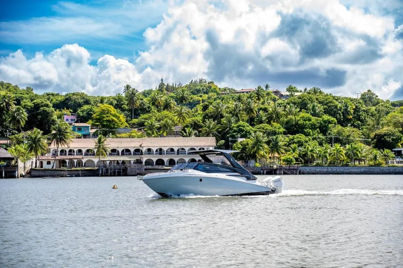 Lr280 Yacht Photos Pics 2024 L'acqua Royale LR280 GRAN CABRIO cruising on a scenic tropical waterway.