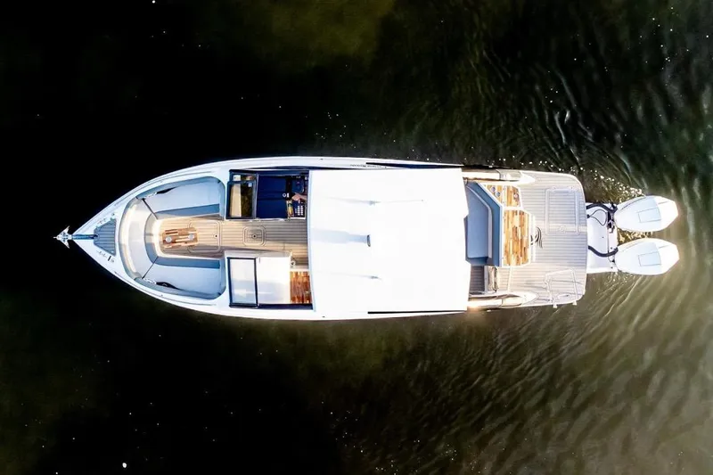 Lr280 Yacht Photos Pics Overhead view of 2024 L'acqua Royale LR280 GRAN CABRIO luxury boat on water.