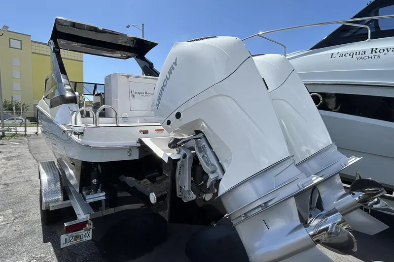 Lr280 Yacht Photos Pics 2024 L'acqua Royale LR280 GRAN CABRIO boat with dual Mercury outboard engines on a trailer.