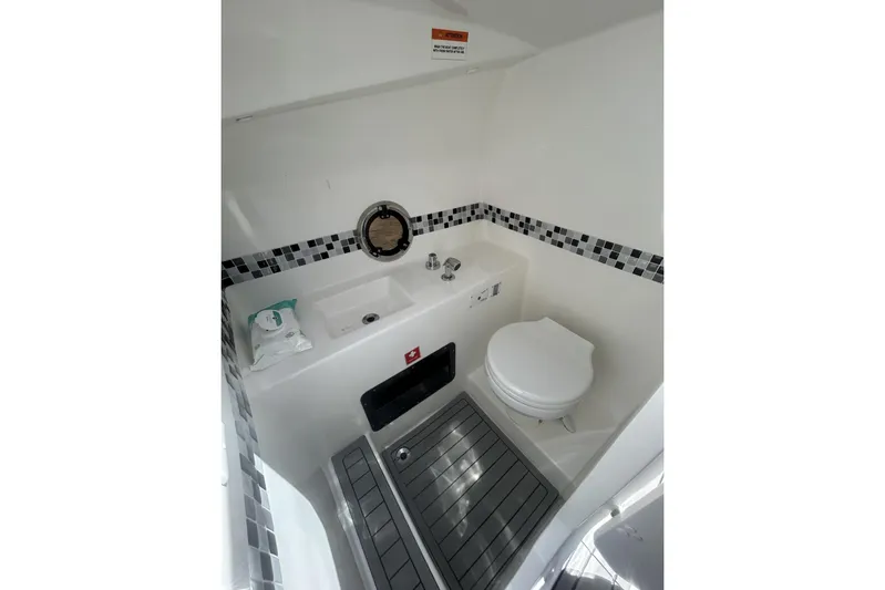 Lr280 Yacht Photos Pics 2024 L'acqua Royale LR280 GRAN CABRIO boat bathroom with modern fixtures and sleek design.