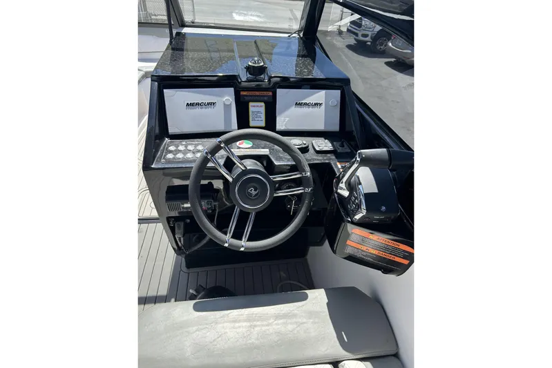 Lr280 Yacht Photos Pics Helm of 2024 L'acqua Royale LR280 GRAN CABRIO with Mercury controls and steering wheel.