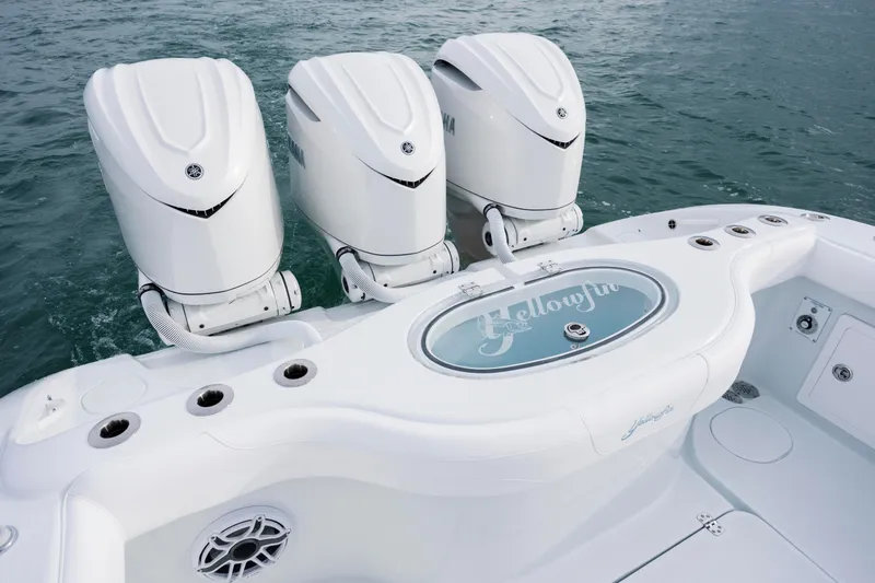  Yacht Photos Pics 2026 Yellowfin 36 Offshore boat with triple outboard engines on the ocean.