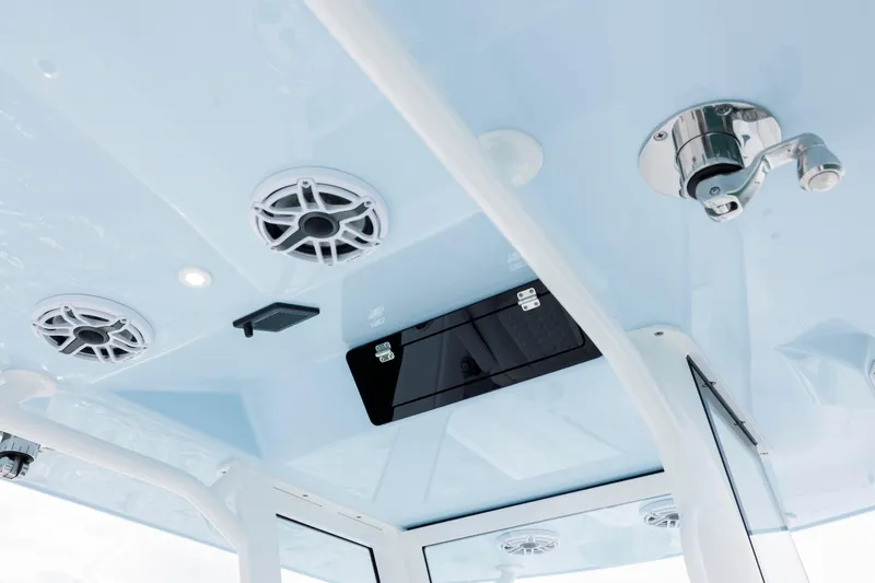  Yacht Photos Pics 2026 Yellowfin 36 Offshore boat interior ceiling with speakers and lighting.