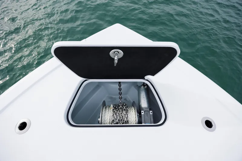  Yacht Photos Pics Open anchor locker on 2026 Yellowfin 36 Offshore boat, showing chain and winch.