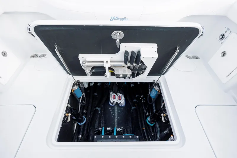  Yacht Photos Pics 2026 Yellowfin 36 Offshore boat engine compartment with open hatch.