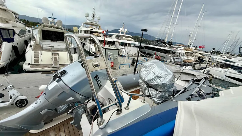  Yacht Photos Pics Docked Majesty 66 Flybridge yacht, 2010 model, surrounded by other luxury boats.