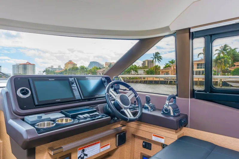  Yacht Photos Pics Interior helm of 2025 Prestige 460 Fly yacht with modern navigation equipment.