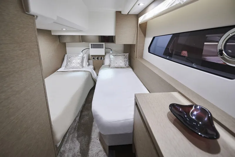  Yacht Photos Pics Luxurious twin cabin interior of 2025 Prestige 460 Fly yacht, featuring modern design and elegant decor.
