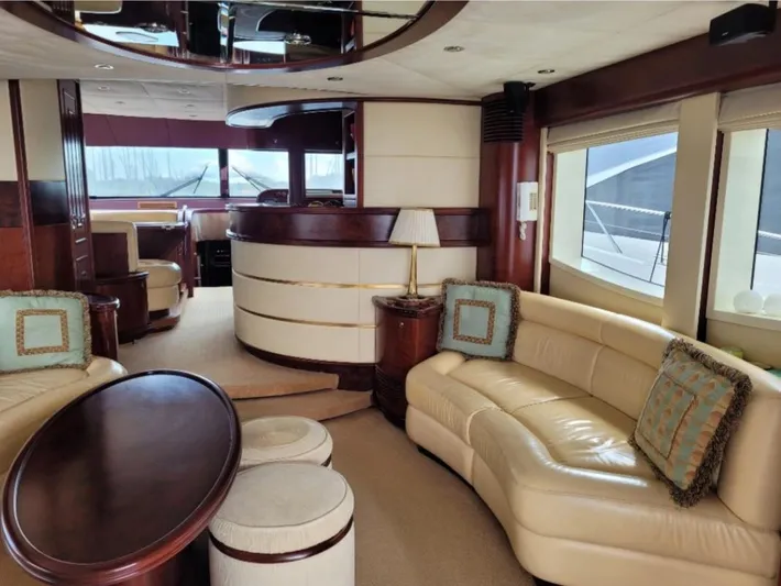  Yacht Photos Pics Luxurious interior of 2010 Majesty 66 Flybridge yacht with elegant seating and decor.