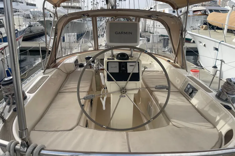 Peetee Hana Yacht Photos Pics 2008 Caliber center cockpit cutter with Garmin navigation, docked in a marina.