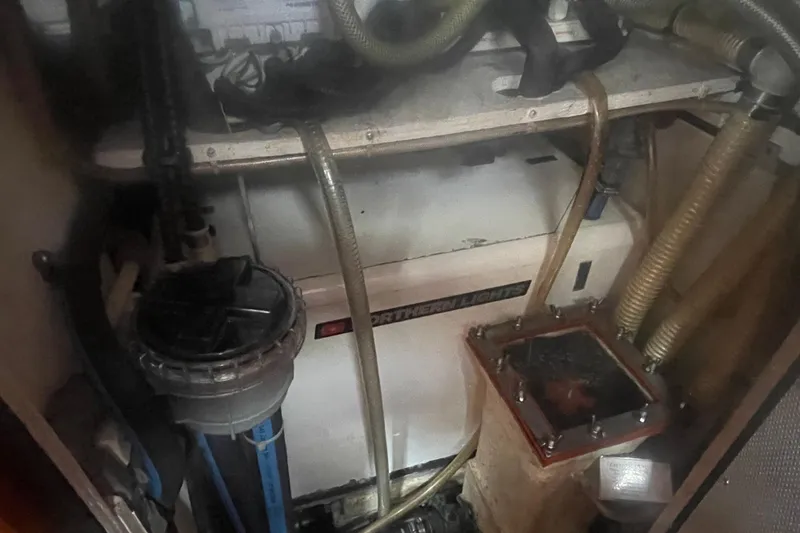 Peetee Hana Yacht Photos Pics Engine room of 2008 Caliber center cockpit cutter with Northern Lights generator.