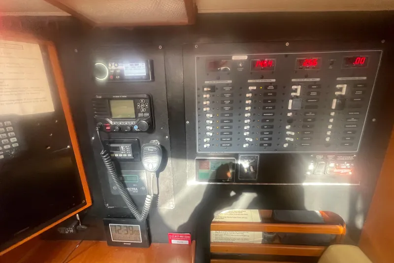 Peetee Hana Yacht Photos Pics Control panel of a 2008 Caliber center cockpit cutter with navigation and communication equipment.