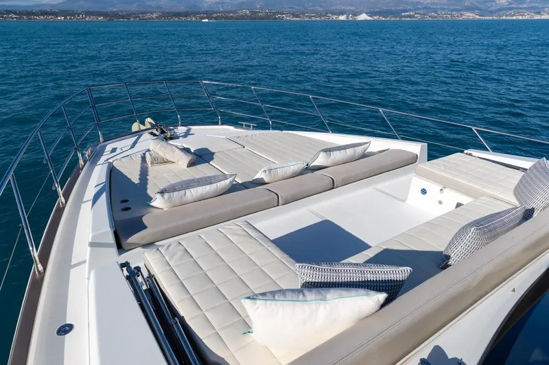 Ombretta V Yacht Photos Pics Luxurious 2016 Azimut 66 yacht with sunbathing deck and scenic ocean view.