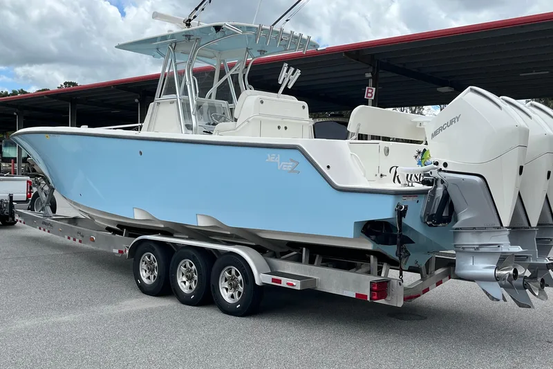  Yacht Photos Pics 2021 SeaVee 340Z boat on trailer with triple Mercury outboard engines.