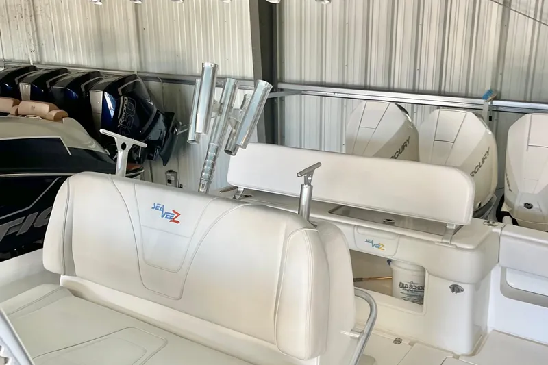  Yacht Photos Pics 2021 SeaVee 340Z boat interior with white seating and multiple outboard engines.
