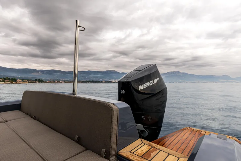  Yacht Photos Pics SuperRib Open 27 boat with Mercury engine on a cloudy day, 2026 model.