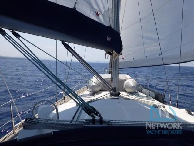  Yacht Photos Pics 2004 Beneteau Oceanis 423 sailing on open sea, view from deck.