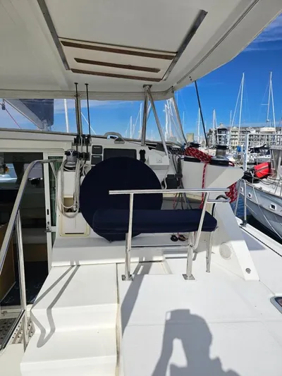 Moondance Yacht Photos Pics 2008 Lagoon 420 yacht helm station with marina backdrop.
