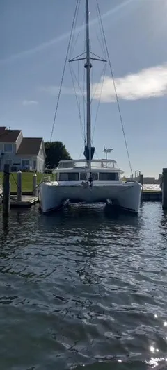Moondance Yacht Photos Pics 2008 Lagoon 420 catamaran docked in a sunny marina.