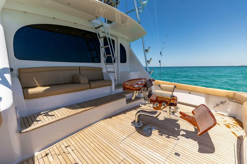 Gas Money Yacht Photos Pics Luxurious 2015 Viking 62 Convertible yacht deck with seating and ocean view.