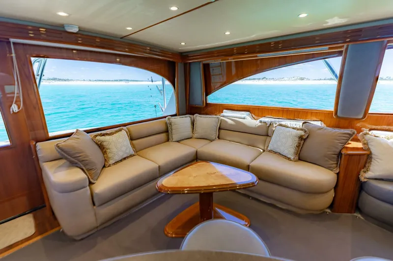 Gas Money Yacht Photos Pics Luxurious interior of 2015 Viking 62 Convertible yacht with ocean view.