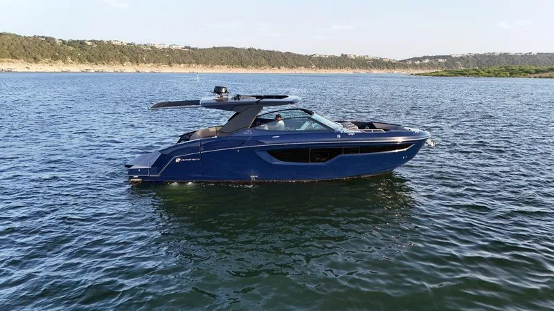  Yacht Photos Pics 2021 Cruisers Yachts 38 GLS I/O on a serene lake.