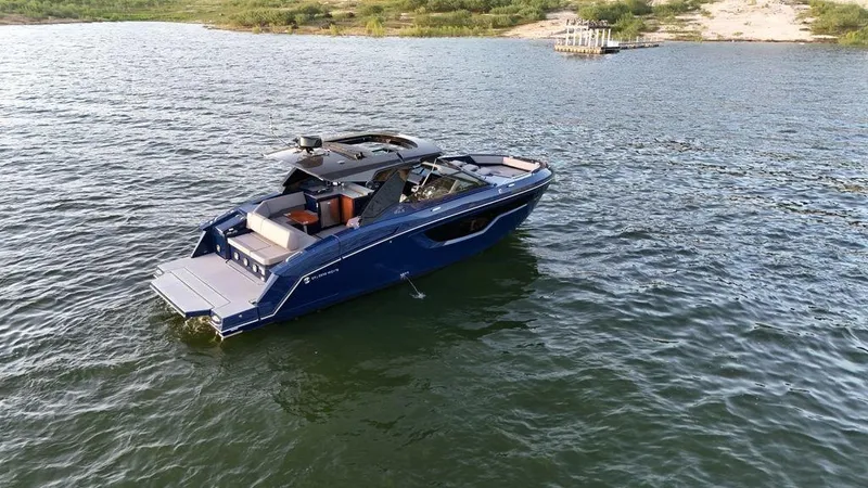  Yacht Photos Pics 2021 Cruisers Yachts 38 GLS I/O on a serene lake.