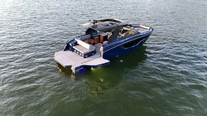  Yacht Photos Pics 2021 Cruisers Yachts 38 GLS I/O on water, showcasing sleek design and spacious deck.