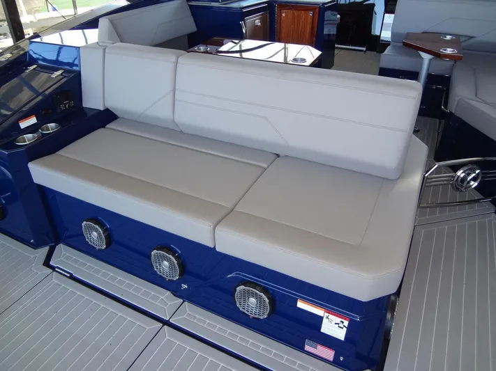  Yacht Photos Pics 2021 Cruisers Yachts 38 GLS I/O interior seating with blue accents and modern design.