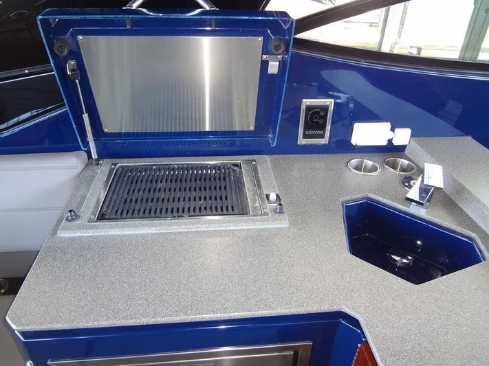  Yacht Photos Pics 2021 Cruisers Yachts 38 GLS I/O boat galley with grill and sink.